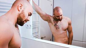 Hot AF bearded Spanish bro Axel Garcia has mesmerizing green eyes and a muscular 6'2" body. Enjoy as he showers and rubs soap all over his body before jerking off his uncut cock.