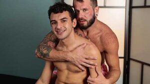 Daniel Greene gives Johnny Hill a massage after their day at the beach. The massage does not last long as Daniel tells Johnny that rubbing his body is making him hard. Johnny wastes no time taking care of Daniel's stiff cock.