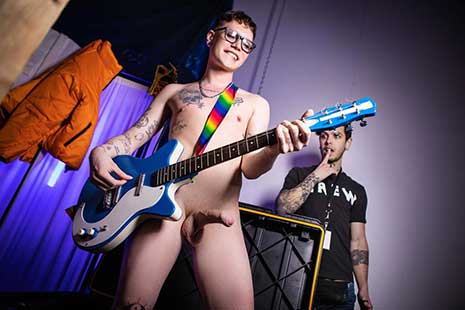 Groupie Marco Bianchi sneaks backstage to try to impress his favorite band with his guitar skills, but instead he's discovered by roadie Dex Parker. Marco offers Dex a blowjob in exchange for the...