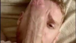 Vertically shot video of a giant, battering ram splitting open a very handsome redhead. Leander pushes himself to the limit by taking a cock that is clearly an inch longer than his entire skull.