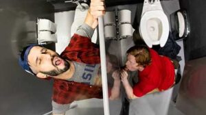 Romeo Davis is cruising at the urinals of the public restroom when Kyle Connors slips off his wedding band and notices Romeo's throbbing uncut member.