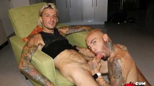 With hot shaggy blonde Christop sprawled across the chair, his big cock swollen and ready to pop a load, Matthew Grande looks especially sexy with HIS golden blonde bleachjob.