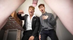 Just as Tony D'Angelo gets on the elevator, his pants fall down! One coworker quickly runs out, but horny hunk Felix Fox gives him a naughty glance as he takes in Tony's dick, then strokes it.