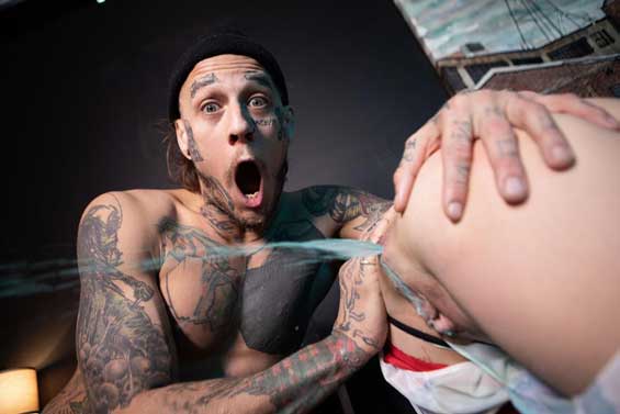 Tattooed blond twink Austin Spears hungrily sucks Bo Sinn, sloppily deepthroating the top before Bo rips open the tguy's shorts for a little art project...