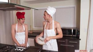 There’s still a lot to do before Christmas, so it’s baking time! Brody is preparing some cookies, and Dakota is eager to help him. Wearing just an apron and the chef’s hat, the two quickly have the mix ready for the oven.