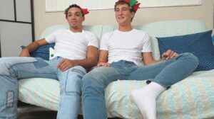 Did you know Santa's elves wear blue underwear? Well, at least these two naughty elves do as they make out on the bed after a long day slaving away in Santa's workshop.