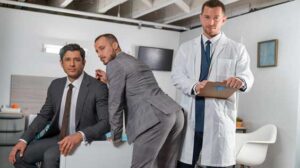 Plastic Surgeon Dr. Johnny Donovan, MD is showing his old college buddy Zack Mackay around his new practice. Zack, a future partner at an accounting firm, is in town on business with his colleague Rocky Vallarta.