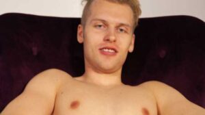 Uwe Weber kneels and gropes his jeans as he feels his clothed chest too. He bares his chest and opens his jeans, pulling out his cock. He wanks his cock to make it good and hard.