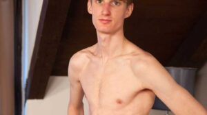 Jenda Knotek is aged 21. He lives in Brno and he works as a receptionist. In his spare time Jenda enjoys sports, jogging and volleyball. He is very relaxed as he sits on the bed and does his interview.