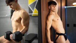 While Michael is in the gym showing some of his favorite workouts, Axel is lifting nearby and notices the end of a jeweled plug poking through the bottom's shorts!