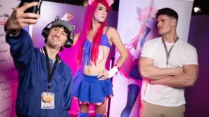 Axelle Rose is supposed to be working as a cosplay babe at the anime con, but while taking pictures with fans, he flirts with Malik Delgaty. Malik hides behind the art banner and sticks his cock