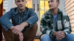 Cole readjusted himself and got into a kneeling position in front of me. He began to slowly pull his pajama bottoms and underwear down, and his huge penis popped out.